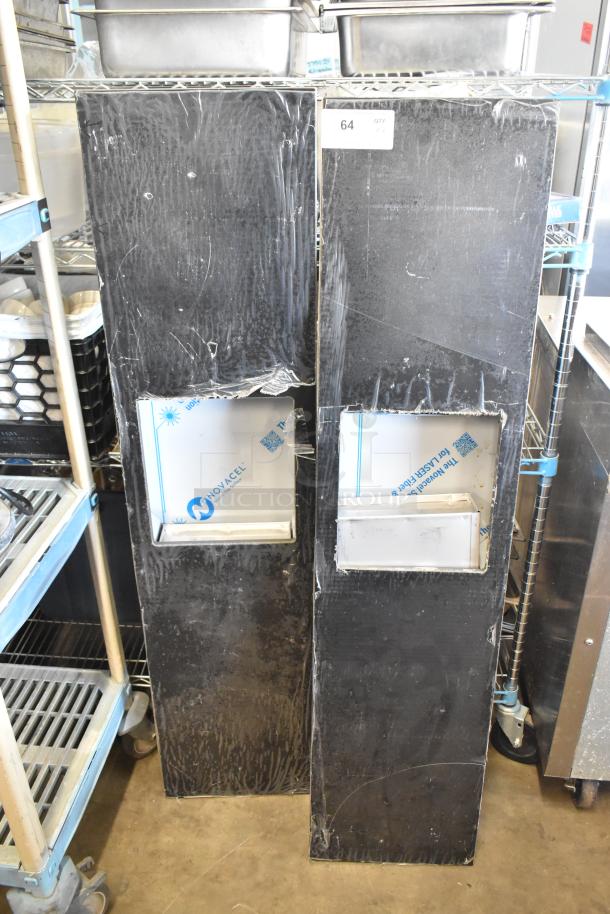 Two black metal storage units with visible wear; rectangular opening on each. Labels read "Novacel" and "64 QTY," indicating lot info.