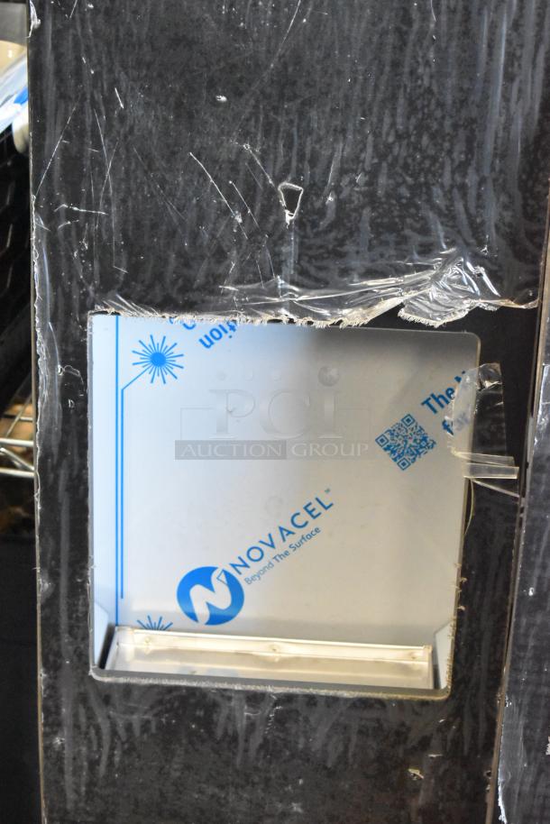 Two metal units with protective Novacel film. Slight scratches on the surface. High durability potential.