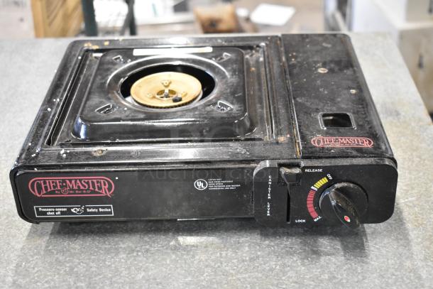 ChefMaster Single Burner Butane Range, black, visible wear, includes pressure-sensor shut off and safety device labels.