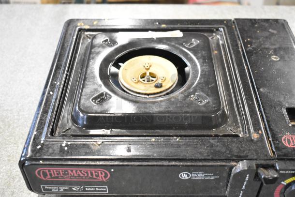 ChefMaster single burner butane range in used condition, featuring safety device markings and pressure-sensor shut-off.