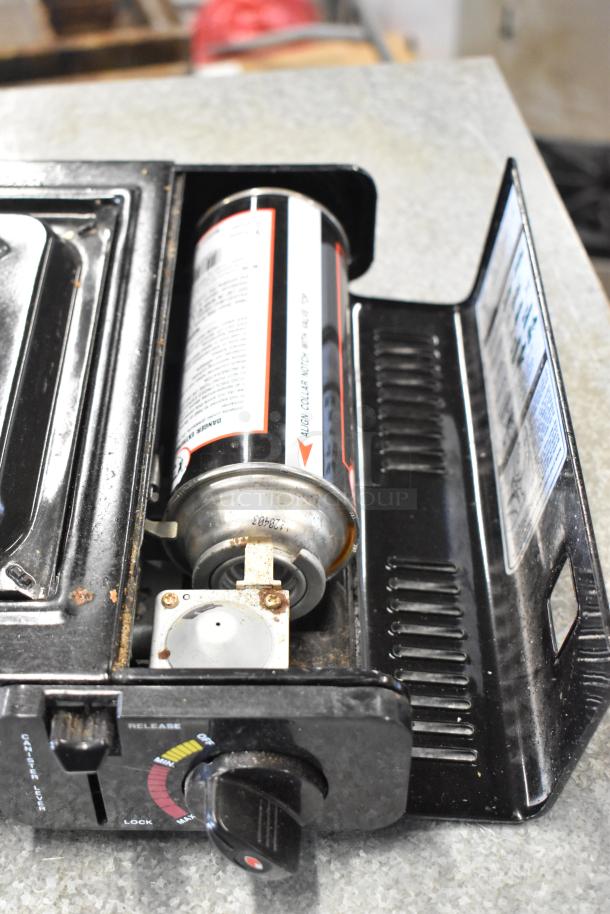 ChefMaster single burner butane range, open top view showing canister compartment, used condition.