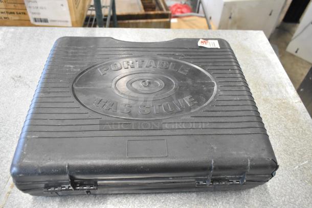 Black carrying case labeled "Portable Gas Stove," part of a two-tier lot including ChefMaster Butane Range.