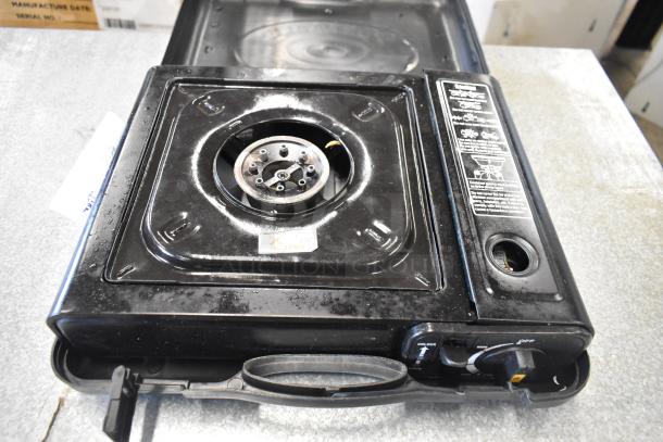 ChefMaster single burner butane range in used condition, with visible wear and control knob. Part of a two-tier auction lot.