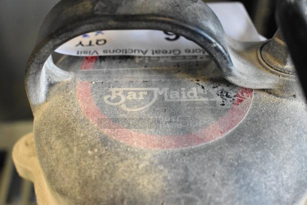 3 Bar Maid electric glass washers in worn condition, 115V, 1 phase. "Bar Maid" logo visible on the dusty surface.