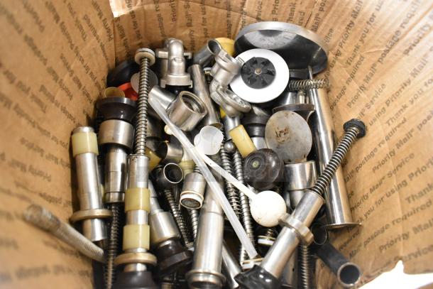 Box containing assorted metal and plastic server pump parts, various shapes and sizes, mixed condition.