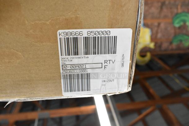 Cardboard box with labeled tag, item code K98666, includes Sabatier interchangeable blade for potato ricer, grey.