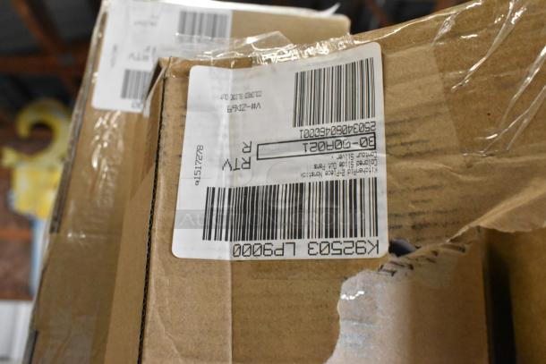 Shipment box with barcode labels, indicating a lot with stackable storage drawers and Sabatier potato ricer blade.