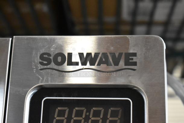 2024 Solwave 180MW1000SS stainless steel commercial countertop microwave oven, 120 volts, visible brand logo.