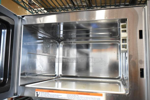 2024 Solwave 180MW1000SS stainless steel commercial countertop microwave oven, 120 volts, 1 phase. Interior view, clean condition.
