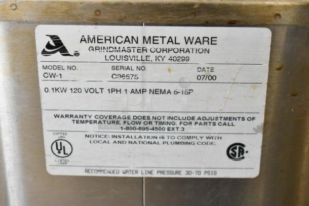American Metalware Grindmaster CW-1 tag. Displays model, serial number C36575, voltage, and warranty details.