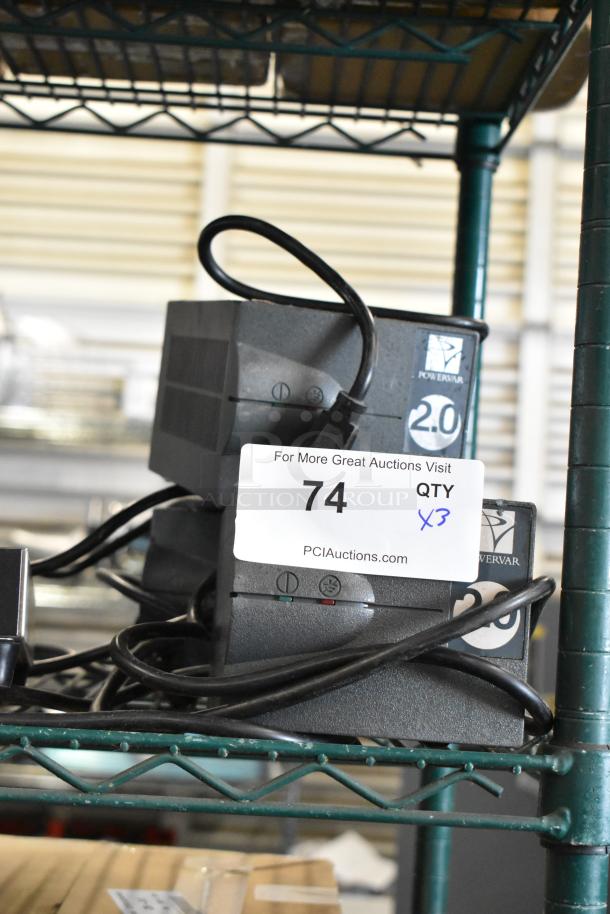 Three Powervar 2.0 power conditioners, 120V, 1 phase, stacked on shelf. Auction tag 74, "QTY x3" visible.