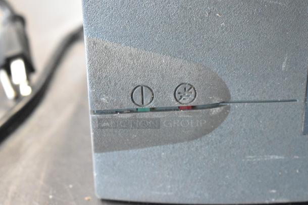 Powervar power conditioner, 120V, 1 phase, close-up of indicator symbols, textured grey surface. Auction: 3 items.