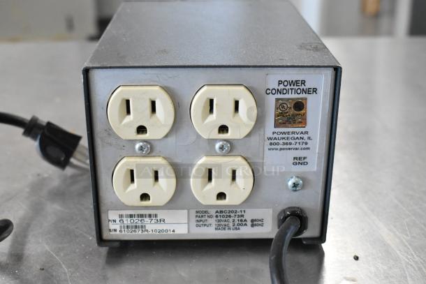 Powervar Power Conditioner, model ABC202-11, 120V, 1 phase, four outlets, made in USA, used condition, with visible labels.