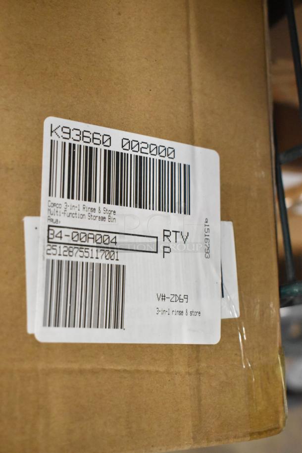 Cardboard box with label. Visible text: "K93660 002000", and "Copco 3-in-1 Rinse & Store Multi-Function Storage Bin".