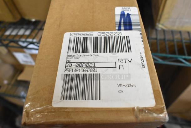 Cardboard box labeled Sabatier Interchangeable Blade Potato Ricer, grey. Barcodes and codes visible.