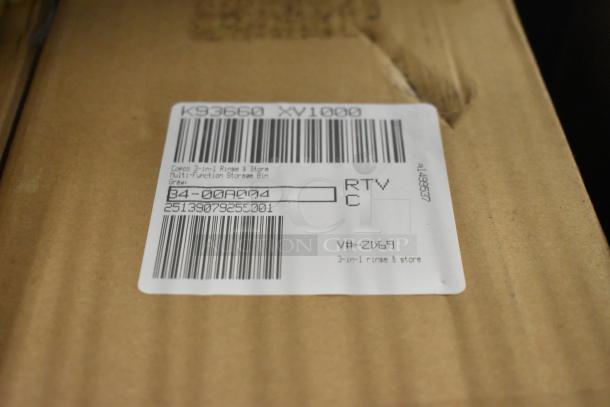 Cardboard box with a label displaying barcodes and product information including "Compo 3-in-1 Rinse & Store Multi-Function Storage Bin."