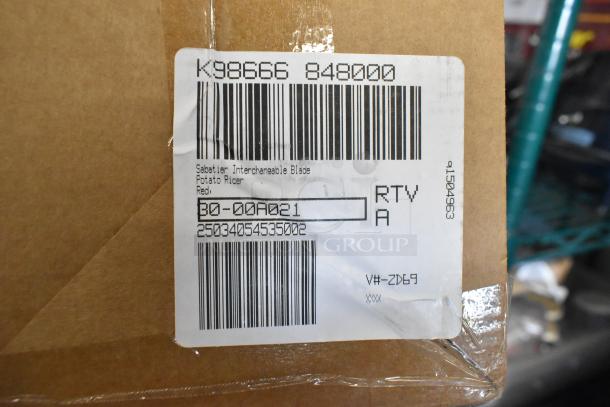Cardboard box with shipping label for Sabatier Interchangeable Blade Potato Ricer, Red. Item code: BO-00A021.