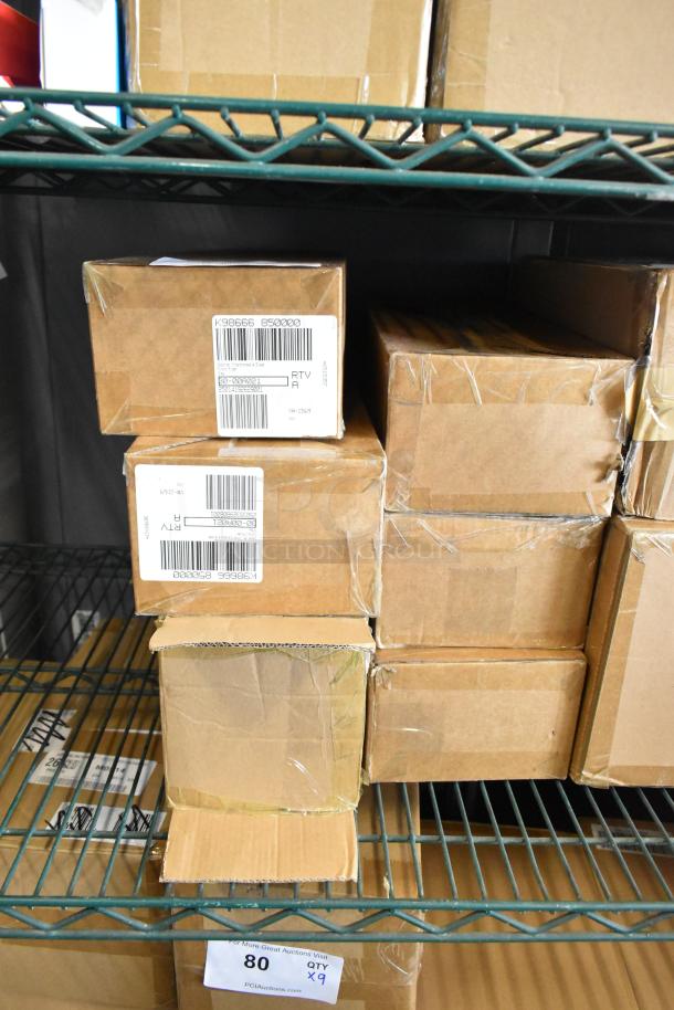 Six boxes of brand new Copco Rinse and Store Multi-Function Storage Bin with Potato Ricer blades on a metal shelf, labeled for auction.