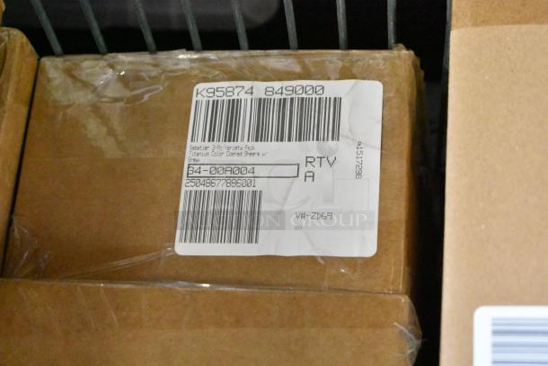5 boxes of new items with stackable egg dispenser, storage drawers, and titanium coated shears. Box label shows "Sabatier 3-Pc Variety Pack".