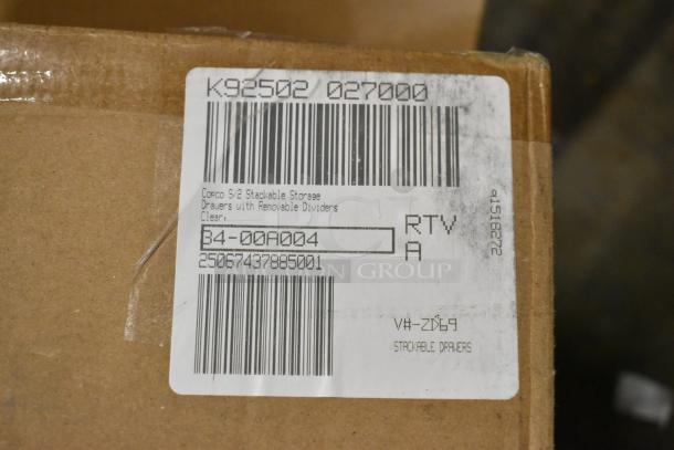 Brown cardboard box with a label marked "Corco S/2 Stackable Storage Drawers with Removable Dividers, Clear." Item new.
