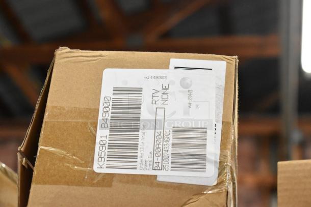 Cardboard box with shipping label, showing multiple barcodes and text. Contains brand new items: egg dispenser, storage drawer, chopper cup.