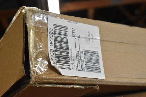 Cardboard box with a label displaying barcodes and text indicating contents as "Copco Set of 2 Stackable Egg Trays & Drawers."