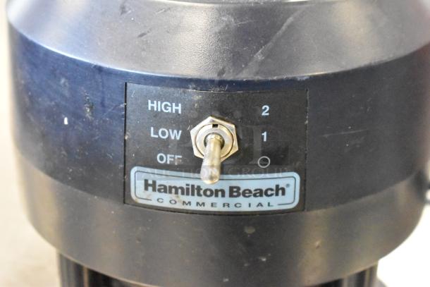 Hamilton Beach Commercial blender base, black with toggle switch for high, low, and off settings. Signs of wear.