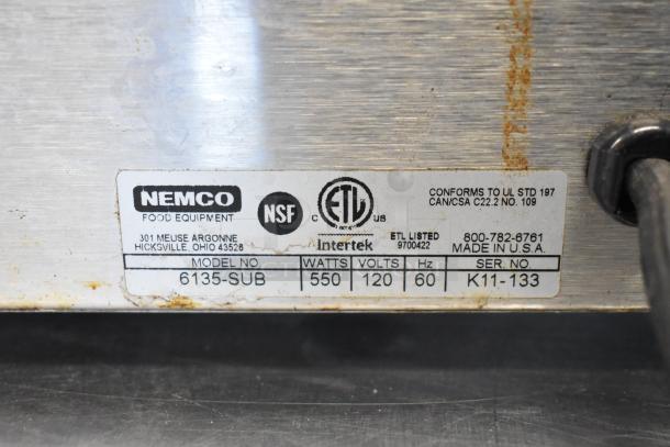 Nemco 6135-SUB Food Warmer label, showing model, power, volts, and manufacturing info. NSF and ETL listed, made in USA.
