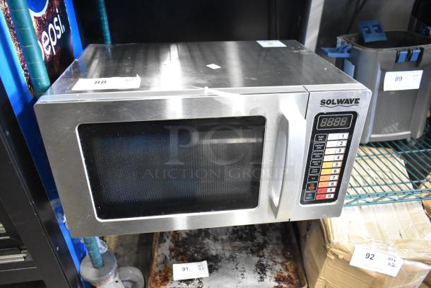 2024 Solwave 180MW1000SS stainless steel commercial microwave oven, with control panel and digital display. Visible model label.