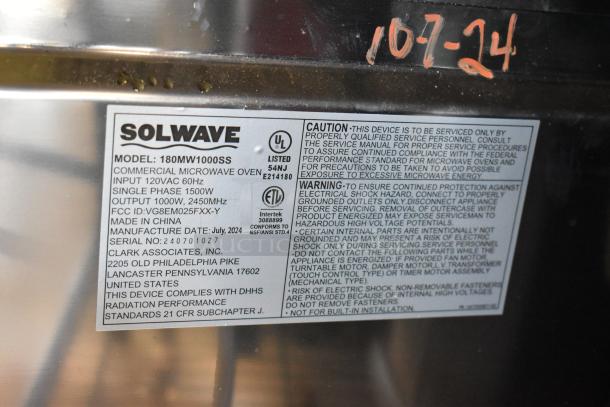 2024 Solwave 180MW1000SS stainless steel commercial countertop microwave, 120 volts, 1 phase, model label shown.