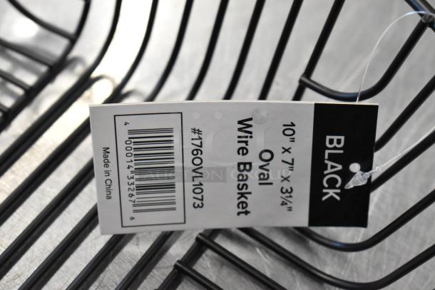 Acopa 176OVL1073 black metal wire basket with tag. Features: 10"x7"x3 3/4", made in China. Includes Dinex bowls.