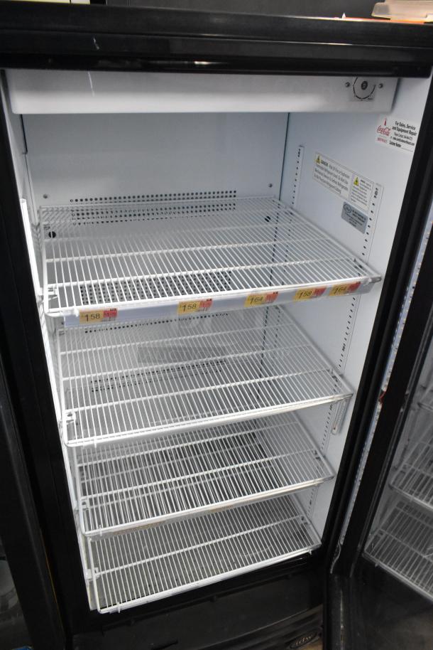 IDW G-10-F334B-HC single door cooler with poly racks, 115V, 1 phase. Clean interior, safety labels visible, metal exterior.
