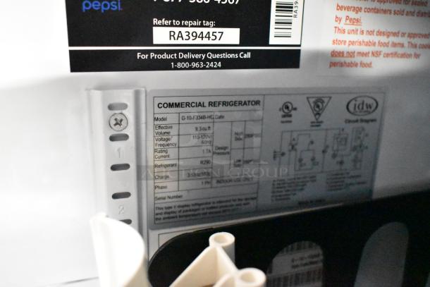 IDW G-10-F334B-HC single door reach-in cooler with poly coated racks. 115V, 1 phase. Label shows model and specs.