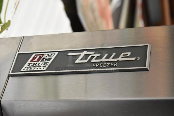 2017 True T-19F stainless steel commercial freezer, single door, poly coated racks, on casters, 115 volts, 1 phase.