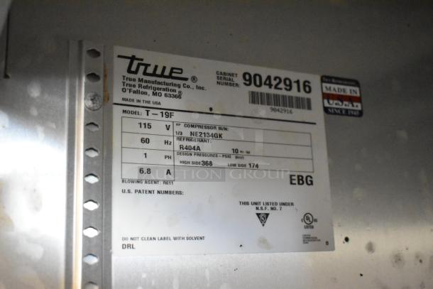 True T-19F Freezer label, displaying model, 115 volts, refrigerant R404A, compressor details, NSF certification.