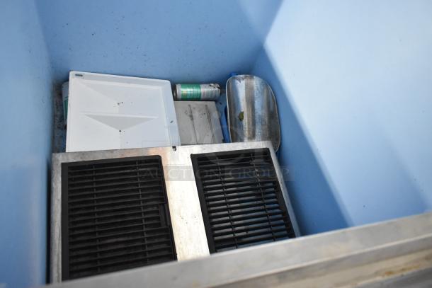 Hoshizaki B-500PF metal commercial ice bin interior, showing grid, tray, and scoop. Slight wear visible.