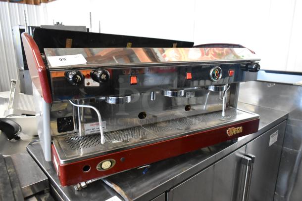Wega Atlas LPUS 3 Group Espresso Machine, metal finish, two steam wands, 230 volts, commercial countertop use.