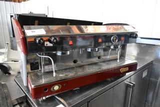 Wega Atlas LPUS 3 Group Espresso Machine, metal finish, two steam wands, 230 volts, commercial countertop use.