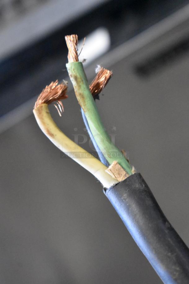 The image shows frayed electrical wires with exposed copper, likely needing repair.