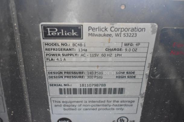 Perlick BC48-1 metal commercial back bar bottle cooler label, detailing model, refrigerant type, power supply, and pressures.
