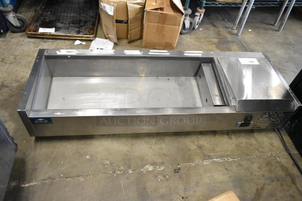 Arctic Air stainless steel commercial refrigerated rail, missing lid, 115 volts, 1 phase, visible wear. Model details visible.