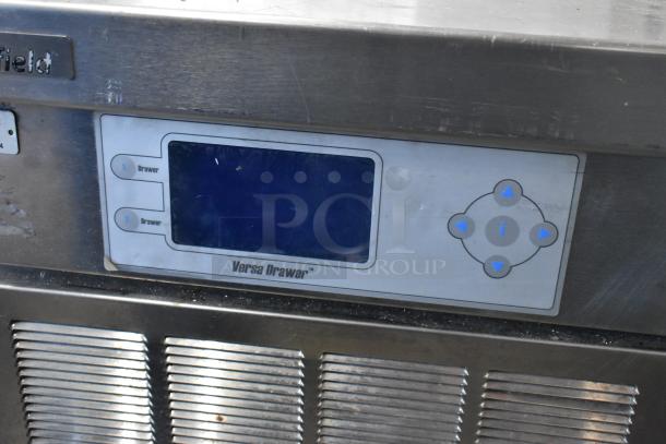 Delfield stainless steel chef base with 2 drawers, commercial casters, and Versa Drawer control panel. 115V, 1 phase.