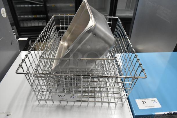4 items including a stainless steel bin and a metal wire basket, good condition, sold as 4 times your bid.