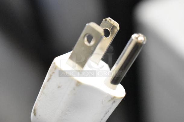 Close-up of a power plug for Eccotemp 6GB-ING indoor tankless water heater.