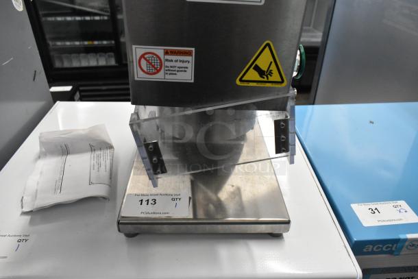 Brand new Edlund 610 Air Powered Crown Punch Can Opener, scratch and dent condition, stainless steel, with safety warnings.