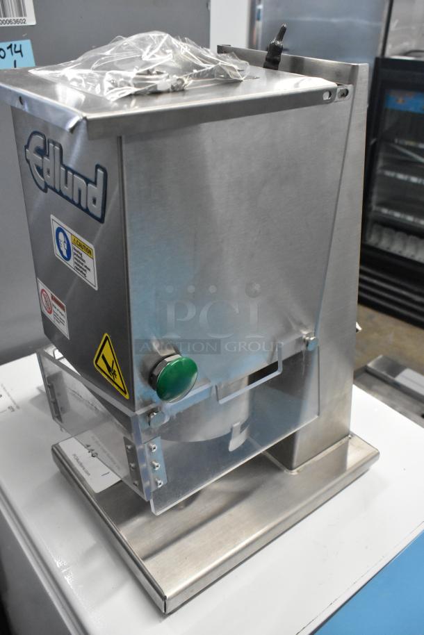 Brand new Edlund 610 air-powered can opener, stainless steel, minor blemishes, safety labels, included accessories in plastic bag.
