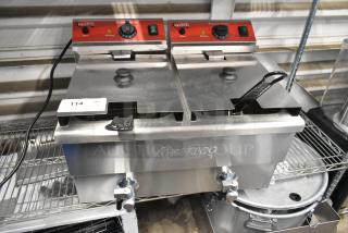 Brand new 2025 Avantco 177F202 stainless steel 30 lb. dual tank electric fryer with two lids, two metal baskets. Scratch and dent condition.