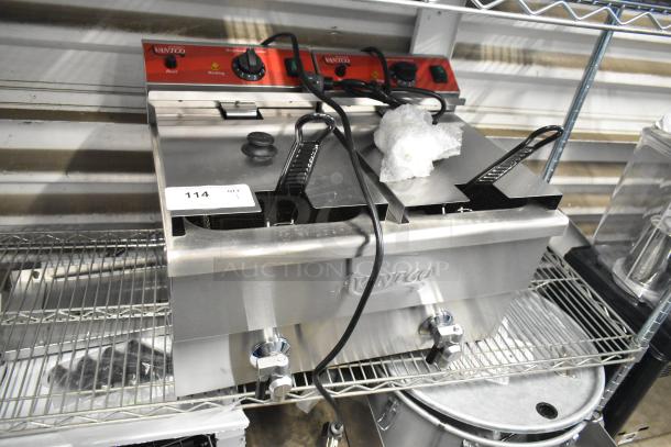 Brand new Avantco 177F202 stainless steel 30 lb. dual tank electric countertop fryer with 2 baskets and lids. Scratch and dent.