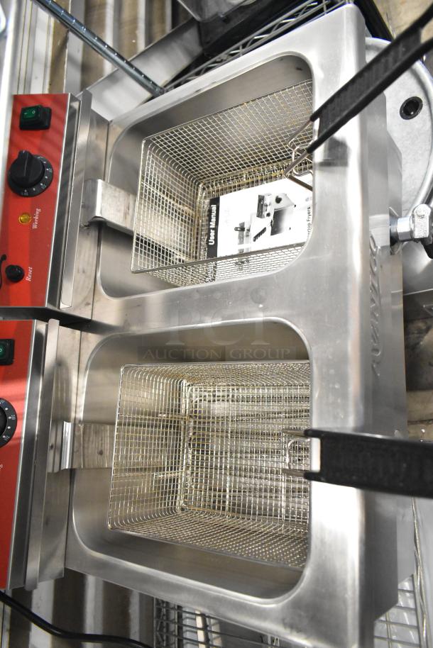 Avantco 177F202 stainless steel dual tank fryer, new condition; includes 2 metal baskets, 2 lids, and user manual.