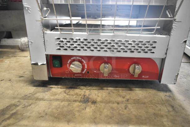 Brand new Avantco 184T3600D stainless steel conveyor toaster with scratches, dents visible. Features 3" opening, 240V, 1 phase.